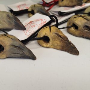 Varjú koponya medálok